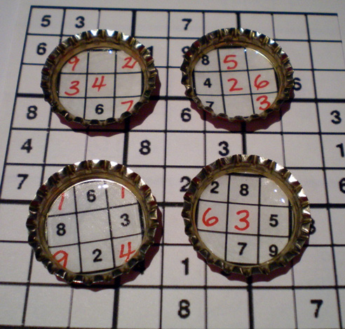 Bottle cap Sudoku magnets