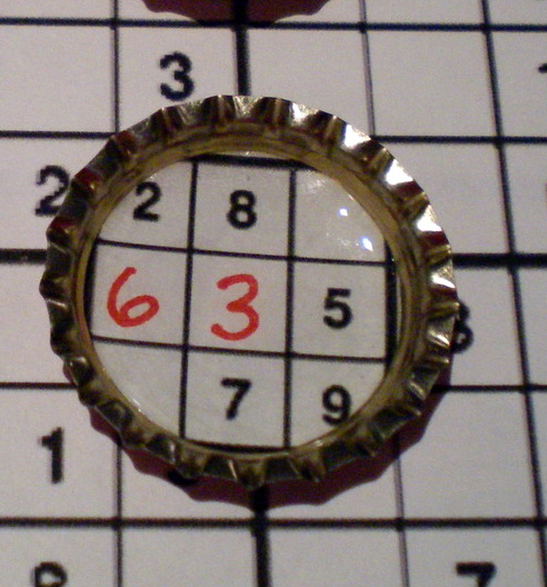 Bottle cap Sudoku magnets detail