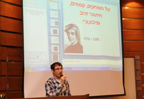 Dr. Yossi Elran, the conference organizer, welcomes the crowd.