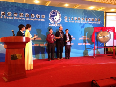 Puzzled in Beijing: Pictures from the 2013 World Sudoku and World Puzzle Championships [Winners of The 22nd World Puzzle Championship: 1. Ulrich Voigt, Germany, 2. Palmer Mebane, USA, 3. Thomas Snyder, USA]
