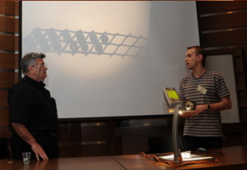 Dr. Oved Kedem (left) and Rami Band (right) play a variation of Nim.